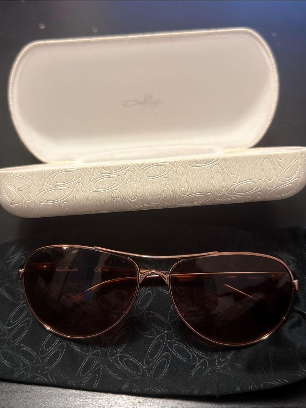 Oakley Women's Rose Gold frame, brownish lens. Aviator Sunglasses - Picture 2 of 10